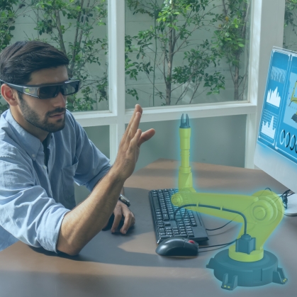 Man using mixed relaity to see virtual robotic arm