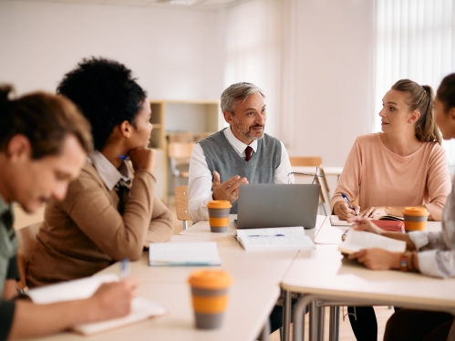 Diverse group of people sitting around a table