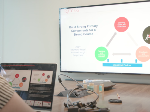 two monitors showing the course design process