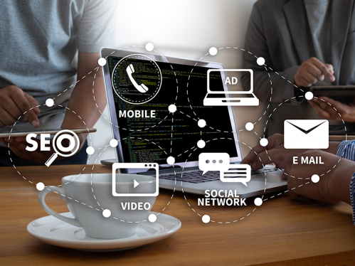 laptop showing various aspects of digital marketing